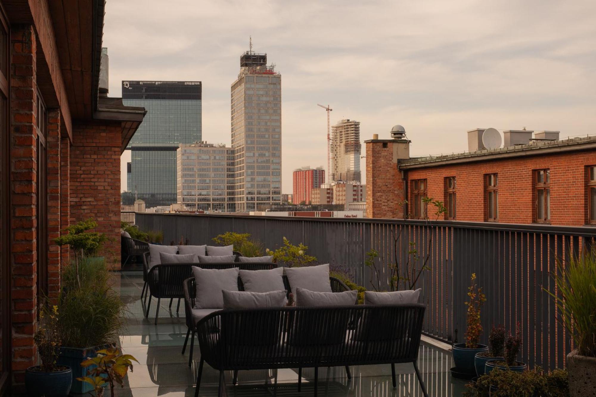 Hotel Monopol Katowice Exterior photo The view from the rooftop terrace